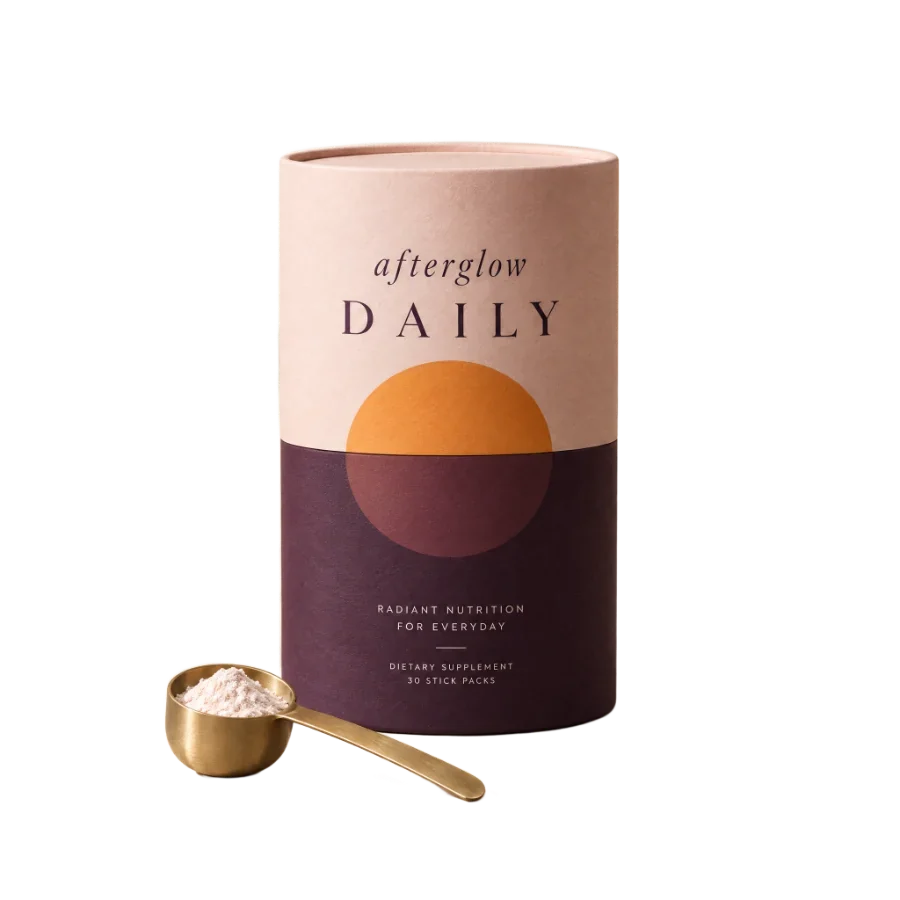 The Afterglow Daily tub with a gold scoop
